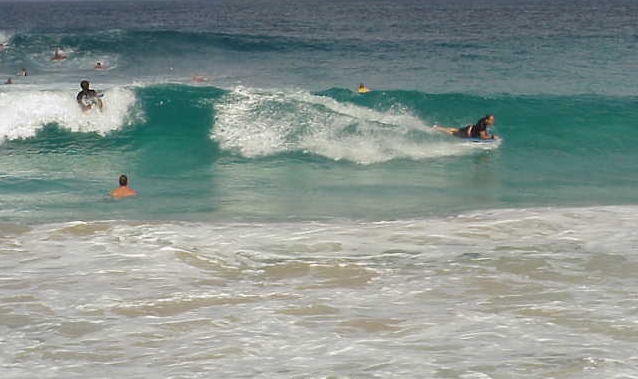 image of surfers at Pyramid Rock